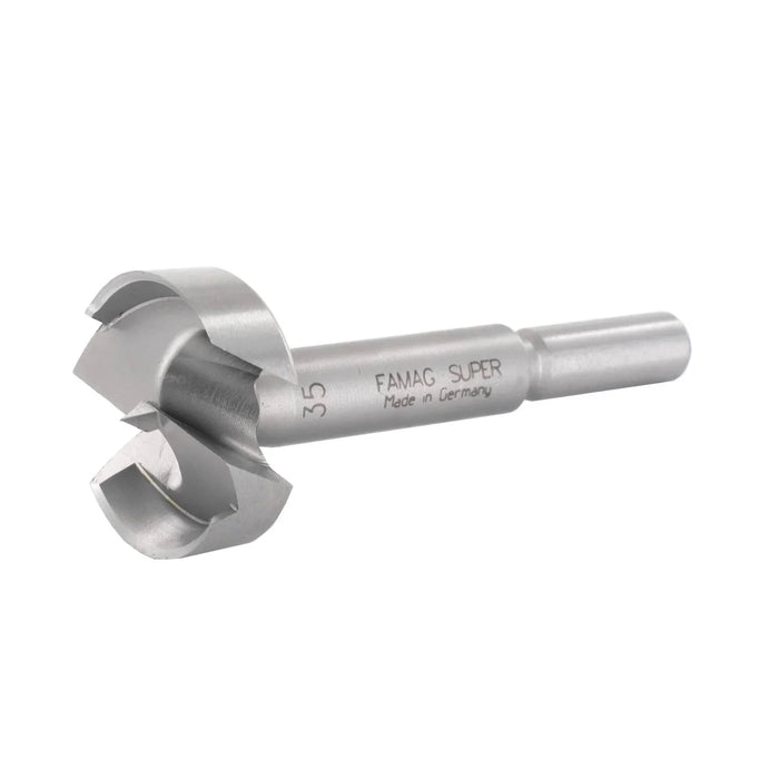 Metal drill bit with '35 FAMAG SUPER Made in Germany' etched into it on a white background