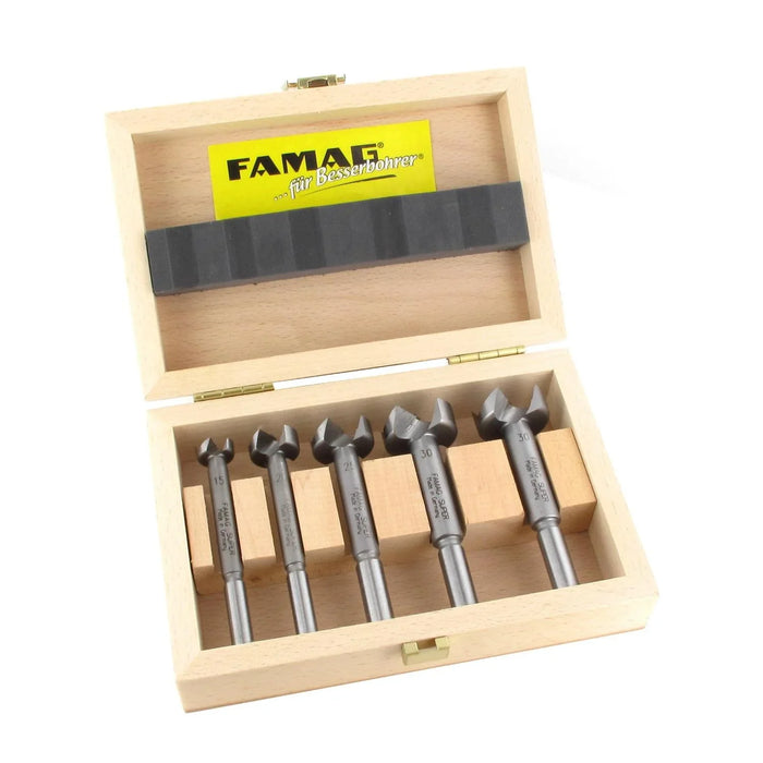 Set 5 of FAMAG Artificial drill bits in a wooden box on a white background