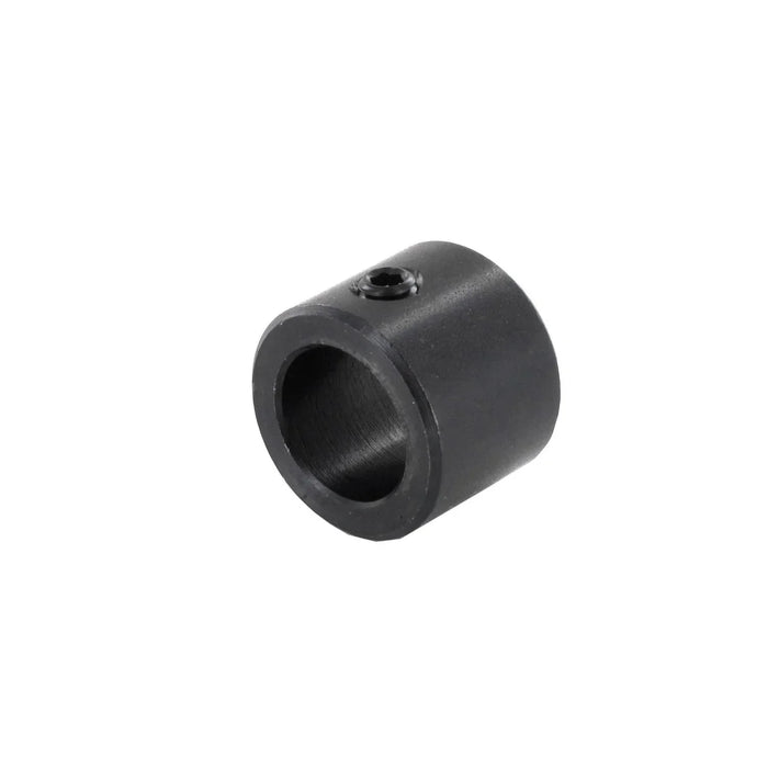 Black metal ring component on a white background