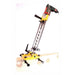 Yellow swivelling drill stand clamped to a wood beam in a reclined position with a drill in place on a white background