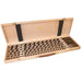 Set of 6 Auger bits in a wooden case on a white background