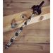 metal Auger with black countersink fitted on a wooden background