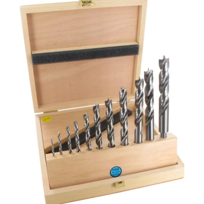 Set of 11 drill bits in a wooden box on a white background