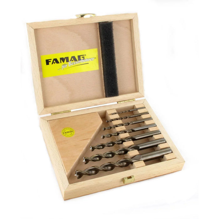 Set of 7 drill bits in a wooden box with FAMAG branding on a white background