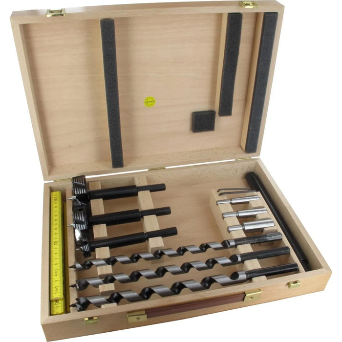 Wooden box containing a set of drill bits and tools on a white background