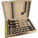Wooden drill bit set with various drill bits and a ruler inside an open wooden box.