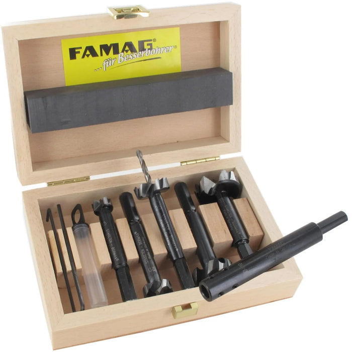 Set of 6 black Bormax WS prima bits with a drill extension and 2 hex keys in a wooden box on a white background