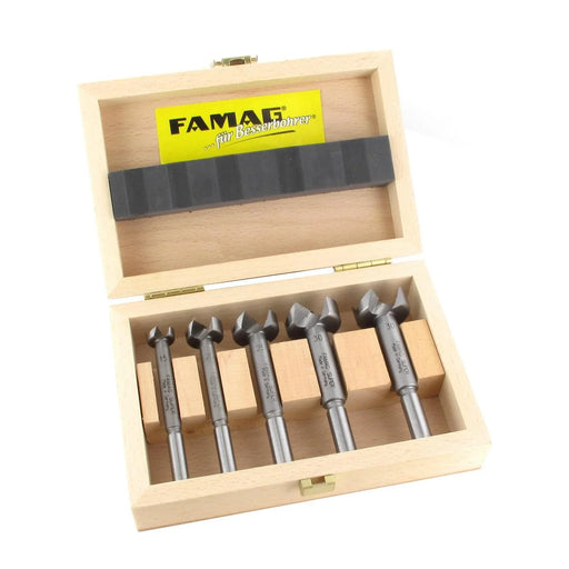 Set 5 of FAMAG Artificial drill bits in a wooden box on a white background