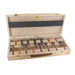 Set of 10 Artificial drill bits in a wooden box on a white background