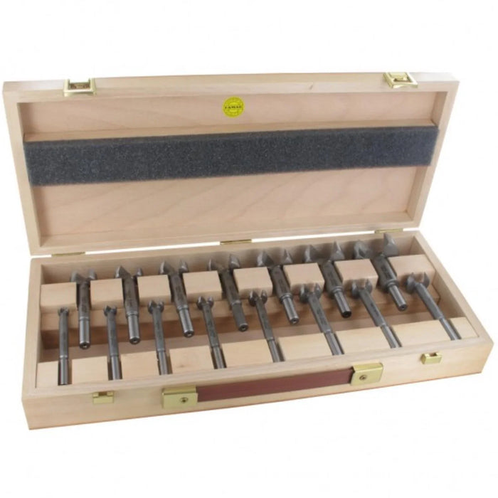 Set of 15 Artificial drill bits in a wooden case on a white background